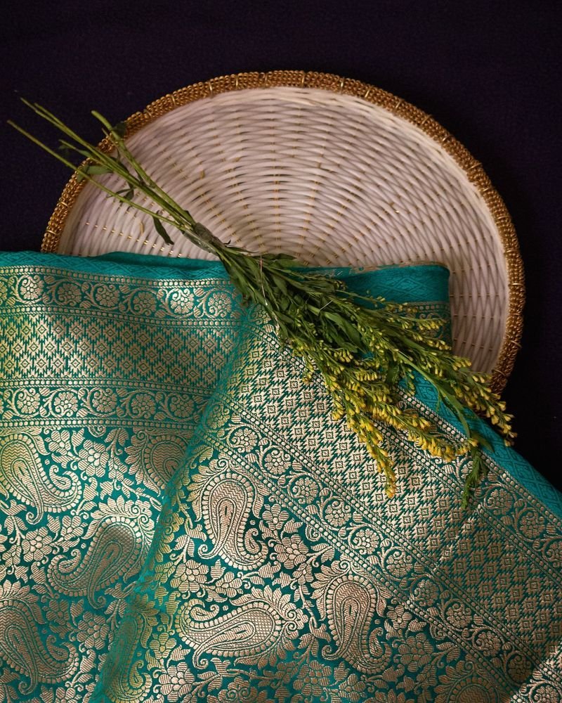 Green silk saree with paisley zari